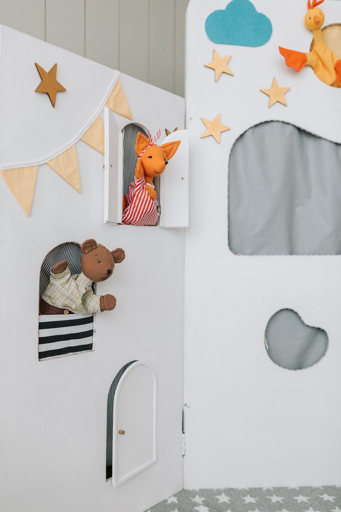 Crafting Captivating Headlines: Your awesome post title goes here Colorful and playful puppet scene featuring handmade puppets in a decorated theater setting.